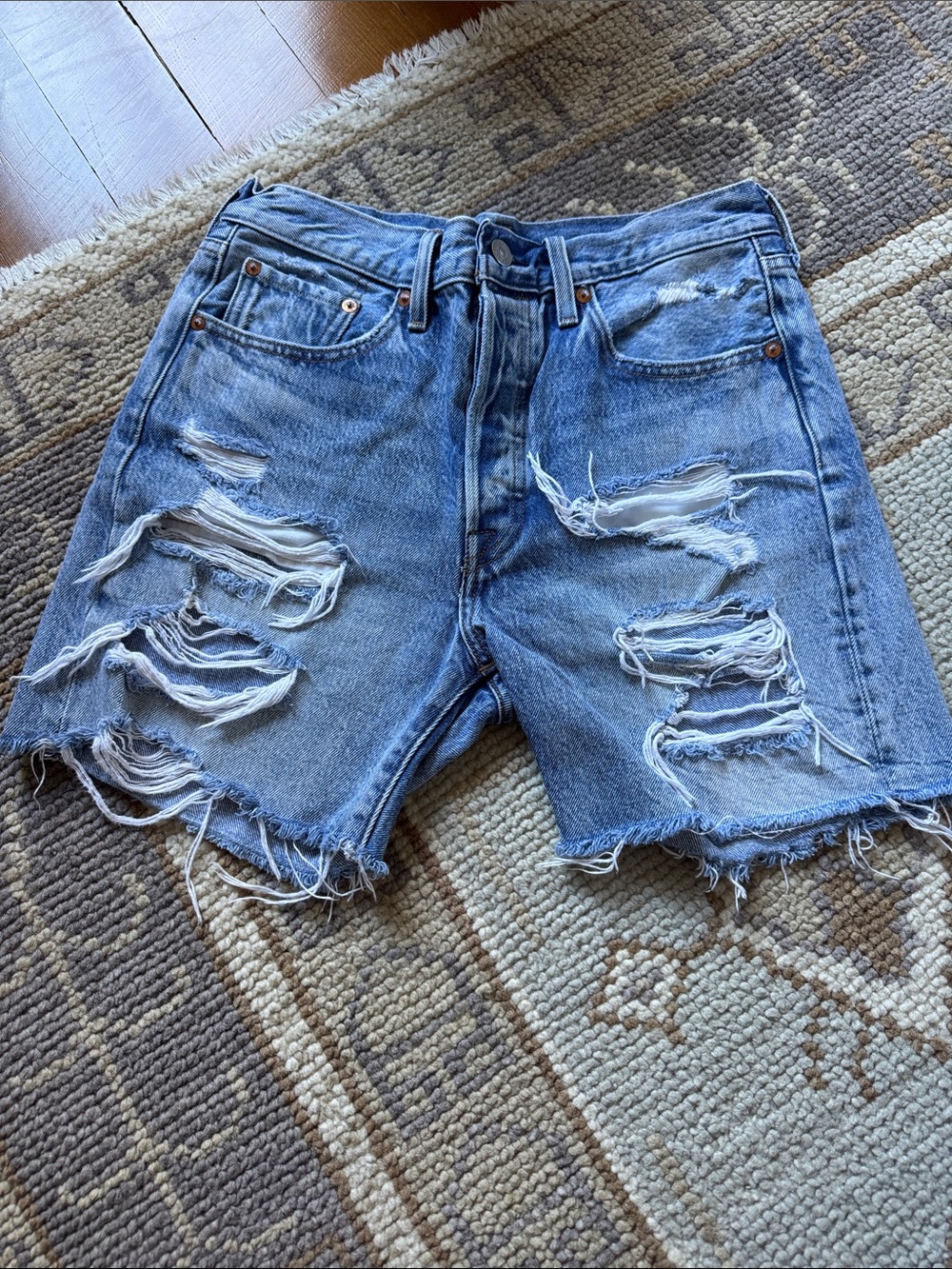 Levi's Light Wash Frayed Denim Cutoff Shorts